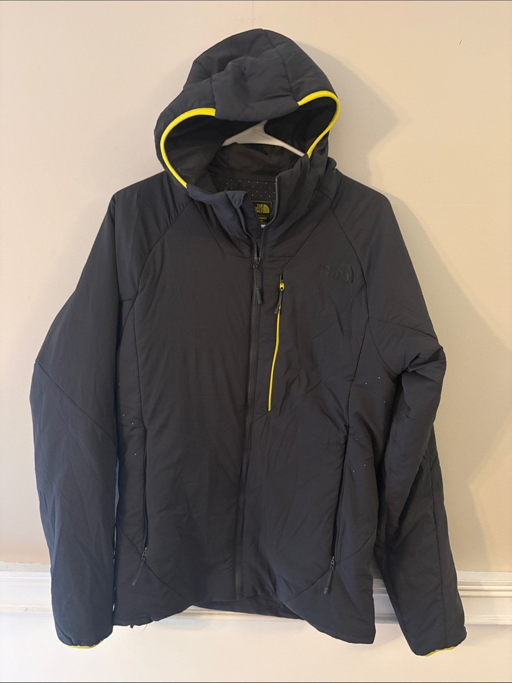 The North Face Men’s Black Jacket with Yellow Trim Hood